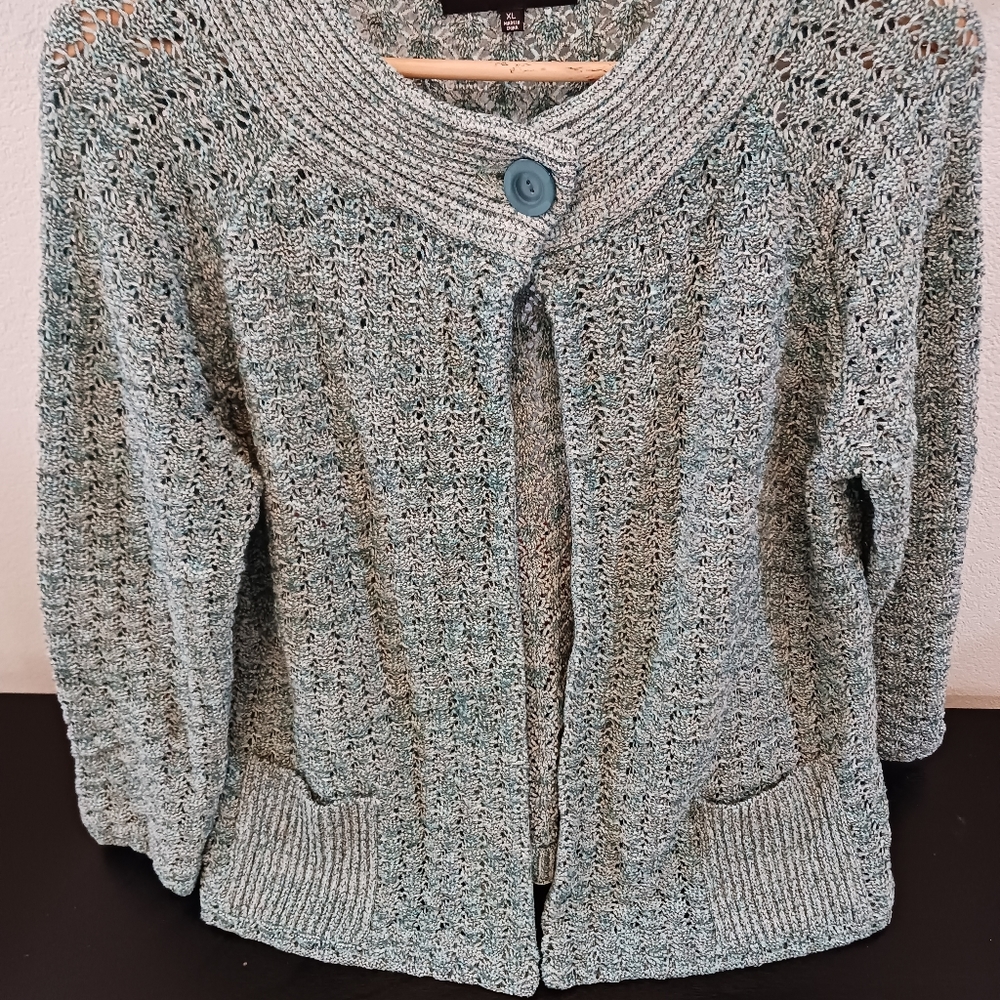 Jones of New York green sweater with round neck with one button also with pocket